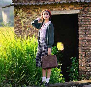 稻熟低穗人熟低声下一句