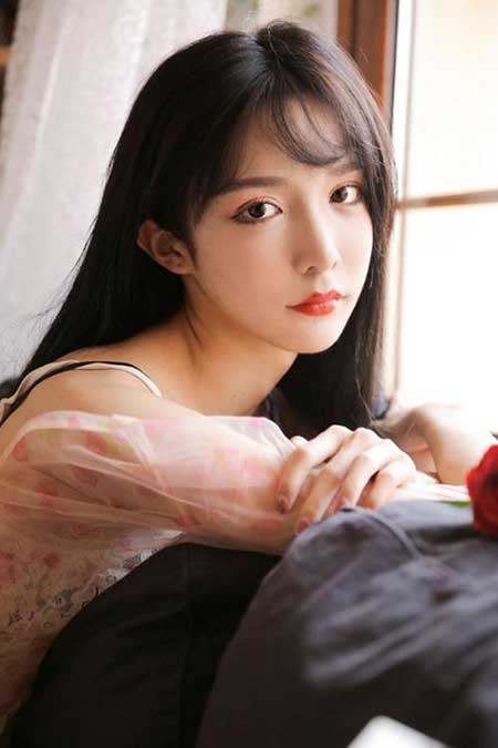 不施粉黛亦倾城下一句